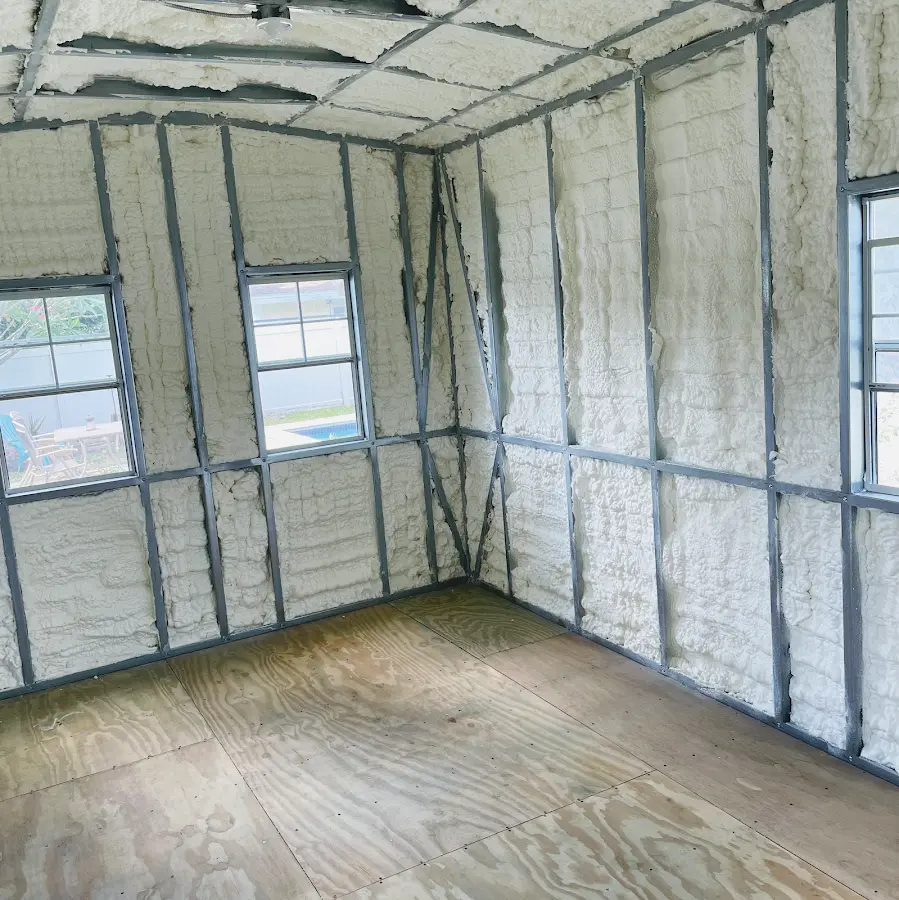 Closed-cell spray foam insulation applied to wall cavities in a residential project in Muskegon Heights